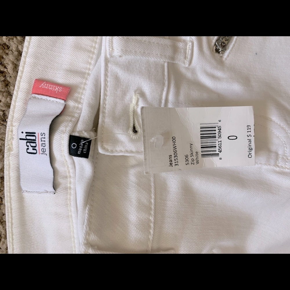 Brand New Cabi Skinny jeans with zipper pockets.